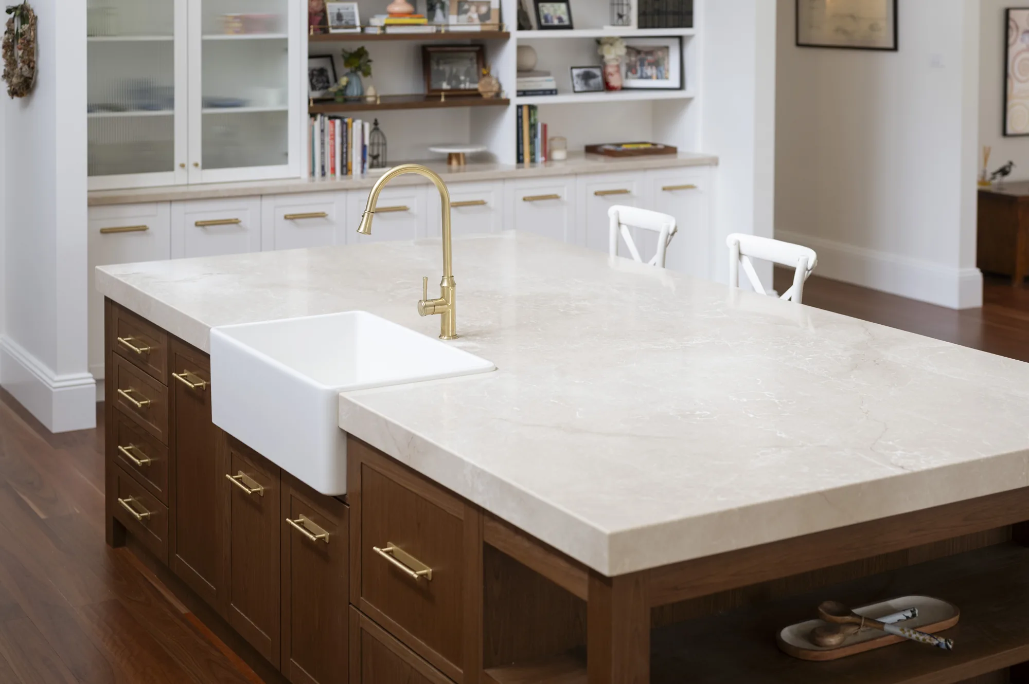 Hamptons kitchen benchtop in cream stone with brass tapware, Bolwarra