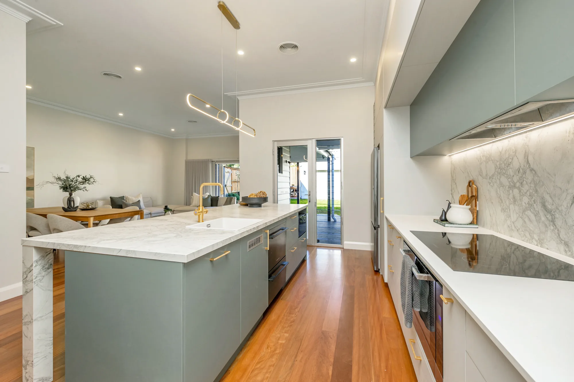 Dawson St: Calacatta-look benchtops in a sage kitchen