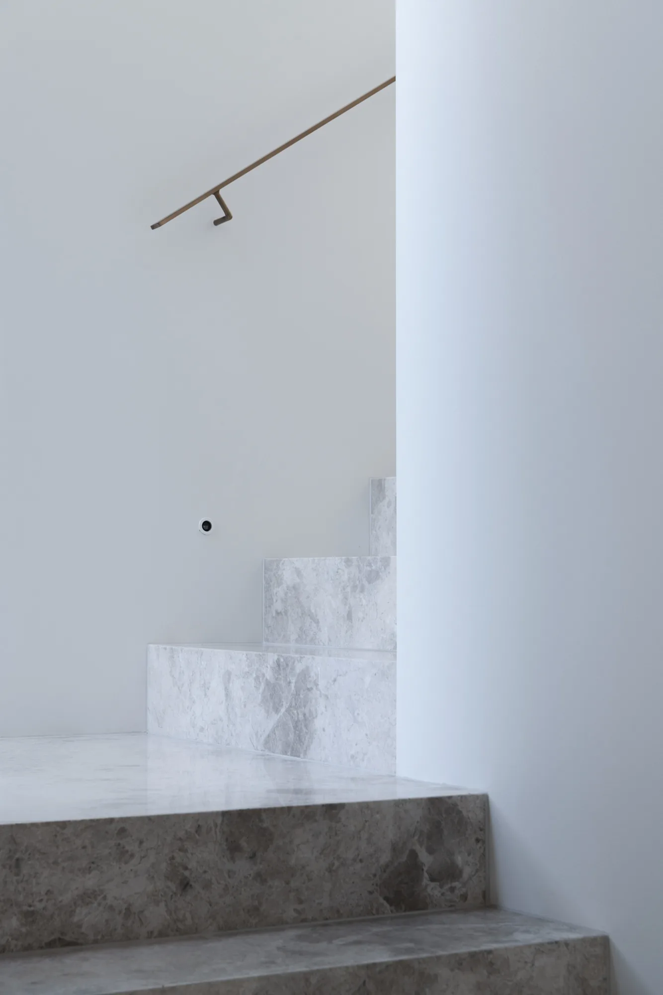Terrigal: full-height marble, stair treads and ocean-view benchtops with Mennie Builders